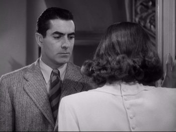Movie still from “The Razor's Edge” (1946), directed by Edmund Goulding – A man and a woman are looking at one another; Close Up shot, Over the shoulder angle