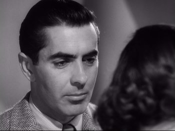 Movie still from “The Razor's Edge” (1946), directed by Edmund Goulding – A black and white photo of a man and a woman; Close Up shot, Over the shoulder angle