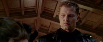 Movie still from “The Replacement Killers” (1998), directed by Antoine Fuqua – A person wearing a leather jacket; Close Up shot, Low angle