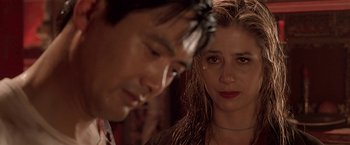 Movie still from “The Replacement Killers” (1998), directed by Antoine Fuqua – A man and a woman looking at one another; Close Up shot, Over the shoulder angle