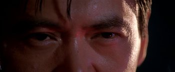 Movie still from “The Replacement Killers” (1998), directed by Antoine Fuqua – View of a man's eyes; Extreme Close Up shot, Low angle
