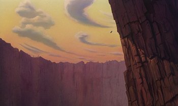 Movie still from “The Rescuers Down Under” (1990), directed by Mike Gabriel – A painting of a bird flying over a cliff; Extreme Wide shot, Low angle