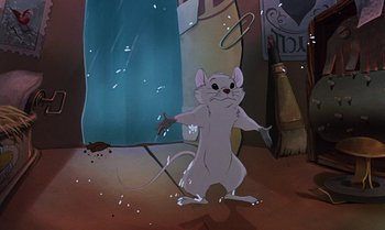 Movie still from “The Rescuers Down Under” (1990), directed by Mike Gabriel – A mouse standing on its hind legs in front of a wall; Wide shot, Low angle