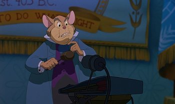 Movie still from “The Rescuers Down Under” (1990), directed by Mike Gabriel – A cartoon of a mouse holding a spoon in front of a frying pan; Medium shot, Over the shoulder angle