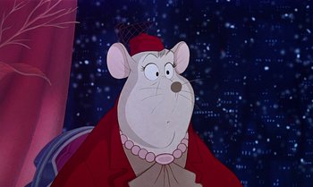 Movie still from “The Rescuers Down Under” (1990), directed by Mike Gabriel – A mouse wearing a red robe and a red hat; Close Up shot, Over the shoulder angle