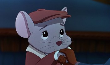 Movie still from “The Rescuers Down Under” (1990), directed by Mike Gabriel – A cartoon mouse wearing a hat and jacket; Close Up shot, Over the shoulder angle
