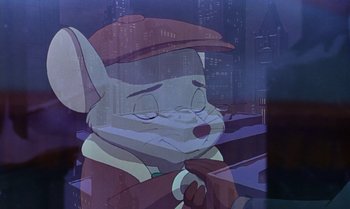 Movie still from “The Rescuers Down Under” (1990), directed by Mike Gabriel – A cartoon of a mouse wearing a red hat; Close Up shot, Over the shoulder angle