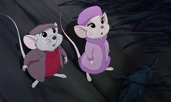 Movie still from “The Rescuers Down Under” (1990), directed by Mike Gabriel – Two cartoon mice are standing next to each other; Medium shot, High angle