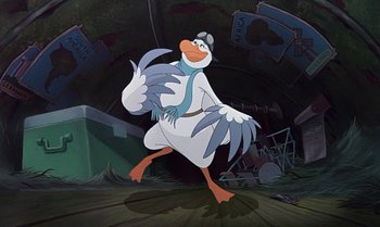 Movie still from “The Rescuers Down Under” (1990), directed by Mike Gabriel – A cartoon of a bird that is standing in the grass; Medium shot, Low angle