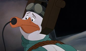 Movie still from “The Rescuers Down Under” (1990), directed by Mike Gabriel – A duck wearing a helmet; Close Up shot, High angle
