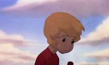 Movie still from “The Rescuers Down Under” (1990), directed by Mike Gabriel – A boy with blonde hair is looking sad; Close Up shot, Low angle