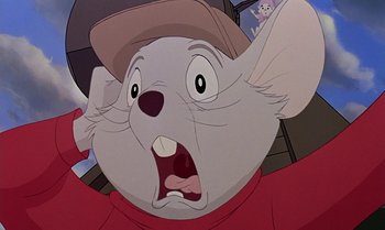 Movie still from “The Rescuers Down Under” (1990), directed by Mike Gabriel – A mouse with a baseball cap is looking surprised; Close Up shot, Over the shoulder angle