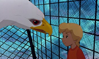 Movie still from “The Rescuers Down Under” (1990), directed by Mike Gabriel – A bald eagle and a blond boy in a cage; Medium shot, Low angle