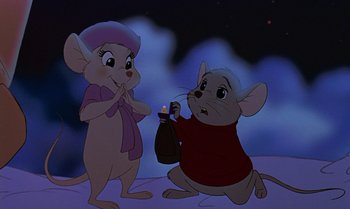 Movie still from “The Rescuers Down Under” (1990), directed by Mike Gabriel – A couple of mice that are standing in the dirt; Medium shot, High angle