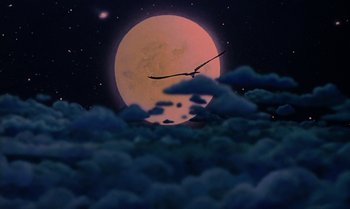 Movie still from “The Rescuers Down Under” (1990), directed by Mike Gabriel – An image of a bird flying in front of the moon; Extreme Wide shot, Low angle