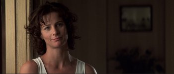 Movie still from “The Rookie” (2002), directed by John Lee Hancock – A person in a room; Close Up shot, Low angle