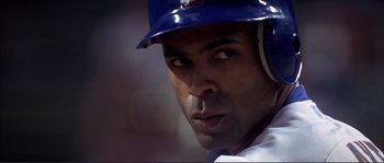 Movie still from “The Rookie” (2002), directed by John Lee Hancock – A baseball player wearing a helmet; Close Up shot, Low angle