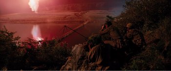 Movie still from “The Sacrifice” (2020), directed by Yang Lu – A man on top of a mountain looking at the sky; Extreme Wide shot, High angle