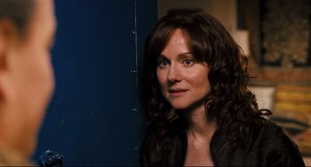 Movie still from “The Savages” (2007), directed by Tamara Jenkins – A person with long hair; Close Up shot, Over the shoulder angle
