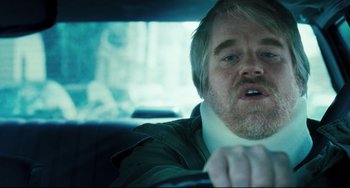 Movie still from “The Savages” (2007), directed by Tamara Jenkins – A person in a car; Close Up shot, Over the shoulder angle