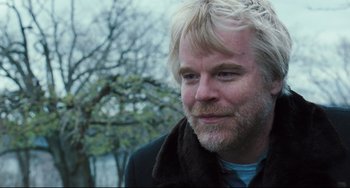 Movie still from “The Savages” (2007), directed by Tamara Jenkins – A person wearing a jacket; Close Up shot, Over the shoulder angle