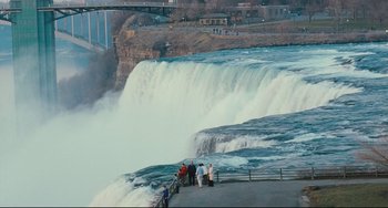Movie still from “The Savages” (2007), directed by Tamara Jenkins – A group of people standing on the side of a waterfall; Extreme Wide shot, High angle