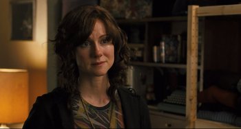 Movie still from “The Savages” (2007), directed by Tamara Jenkins – A person with curly hair; Close Up shot, Over the shoulder angle