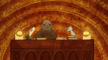 Movie still from “The Secret of Kells” (2009), directed by Nora Twomey – An old man sitting at a table in front of a fireplace; Medium shot, Low angle