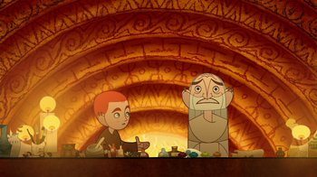Movie still from “The Secret of Kells” (2009), directed by Nora Twomey – An illustration of a boy and an old man in front of an oven; Medium shot, Over the shoulder angle
