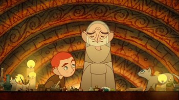 Movie still from “The Secret of Kells” (2009), directed by Nora Twomey – An old man and a young boy are in front of an ornate wall; Medium shot, Over the shoulder angle