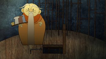 Movie still from “The Secret of Kells” (2009), directed by Nora Twomey – An animated picture of an old man in a chair; Medium shot, Low angle