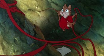 Movie still from “The Secret of NIMH” (1982), directed by Don Bluth – A cartoon picture of a mouse flying through the air; Wide shot, Overhead angle