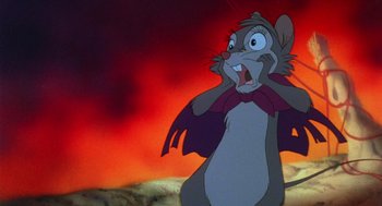 Movie still from “The Secret of NIMH” (1982), directed by Don Bluth – A mouse that is standing in the dirt; Close Up shot, Over the shoulder angle