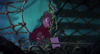 Movie still from “The Secret of NIMH” (1982), directed by Don Bluth – A mouse that is sitting in a cage; Medium shot, High angle