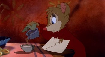 Movie still from “The Secret of NIMH” (1982), directed by Don Bluth – A cartoon of a mouse sitting at a table with a bowl of soup; Medium shot, High angle