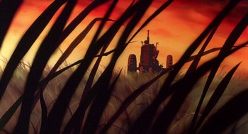 Movie still from “The Secret of NIMH” (1982), directed by Don Bluth – A tractor in the middle of a grassy field at sunset; Extreme Wide shot, Low angle
