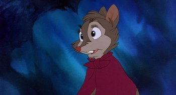 Movie still from “The Secret of NIMH” (1982), directed by Don Bluth – A picture of a mouse in a red cape; Close Up shot, High angle