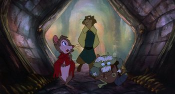 Movie still from “The Secret of NIMH” (1982), directed by Don Bluth – A group of cartoon characters standing in a tunnel; Wide shot, High angle