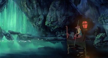 Movie still from “The Secret of NIMH” (1982), directed by Don Bluth – An animated scene of a cave with a man and a cat; Extreme Wide shot, High angle