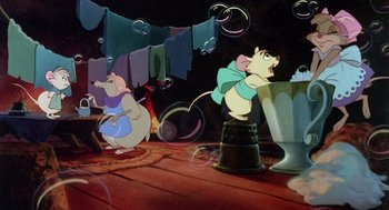 Movie still from “The Secret of NIMH” (1982), directed by Don Bluth – A cartoon of a mouse and a mouse in a room with bubbles floating in the air; Wide shot, High angle