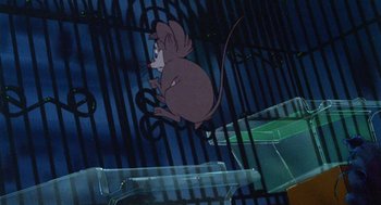 Movie still from “The Secret of NIMH” (1982), directed by Don Bluth – A mouse is flying through the air while holding a pair of scissors; Wide shot, High angle