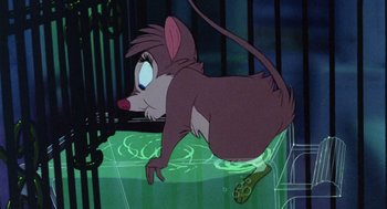 Movie still from “The Secret of NIMH” (1982), directed by Don Bluth – A mouse that is sitting in a cage; Medium shot, High angle