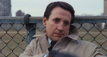 Movie still from “The Seven-Ups” (1973), directed by Philip D'Antoni – A person wearing a jacket; Close Up shot, Low angle