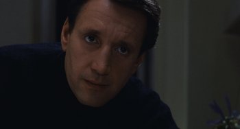 Movie still from “The Seven-Ups” (1973), directed by Philip D'Antoni – A person looking at the camera; Close Up shot, Over the shoulder angle