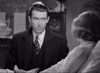 Movie still from “The Shop Around the Corner” (1940), directed by Ernst Lubitsch – A black and white photo of a man and a woman; Close Up shot, Over the shoulder angle