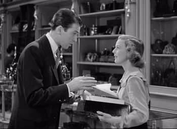 Movie still from “The Shop Around the Corner” (1940), directed by Ernst Lubitsch – A man and a woman are talking to each other; Medium shot, Over the shoulder angle