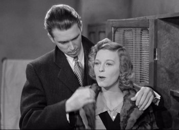 Movie still from “The Shop Around the Corner” (1940), directed by Ernst Lubitsch – A man and a woman are standing together; Medium shot, Low angle