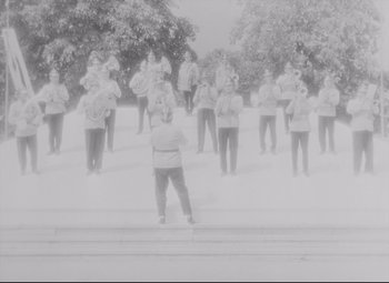 Movie still from “The Shop on Main Street” (1965), directed by Ján Kadár – A black and white photo of a band in the snow; Extreme Wide shot, High angle