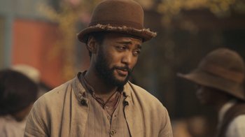 Movie still from “Anne with an E” (2017), created by Moira Walley-Beckett – A man wearing a brown hat and a brown shirt; Close Up shot, Over the shoulder angle