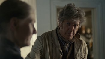 Movie still from “Anne with an E” (2017), created by Moira Walley-Beckett – A man in a tan jacket looking at another man in a tan jacket; Close Up shot, Over the shoulder angle